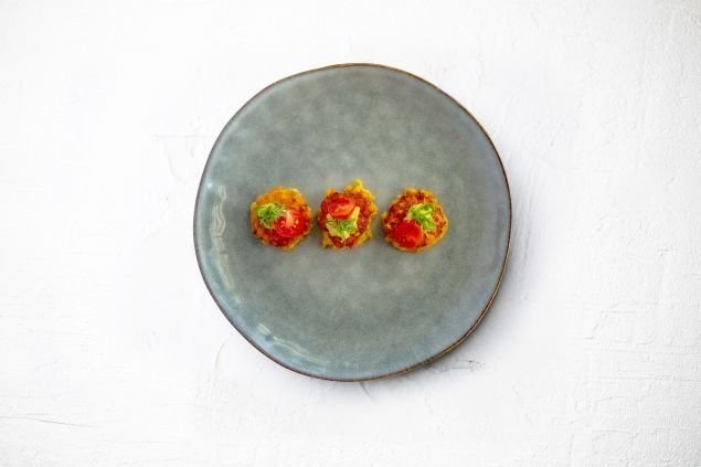 Blackened corn and mint blinis, avocado salsa